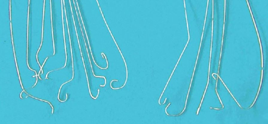 a handful of kinked guidewires from Schummer, 2015